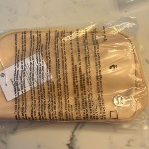 NWT Lululemon 1L cream color belt bag